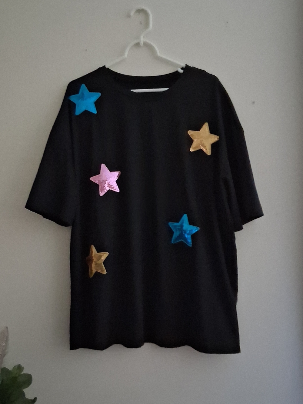 SHEIN Black Short Sleeve Tee with Blue, Pink, and Gold Star Accents